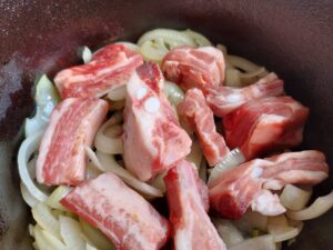 Braised pork ribs with savoy cabbage - raw pork ribs