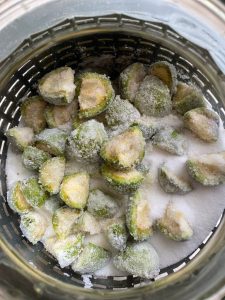 Homemade nocino - sugar covered walnuts